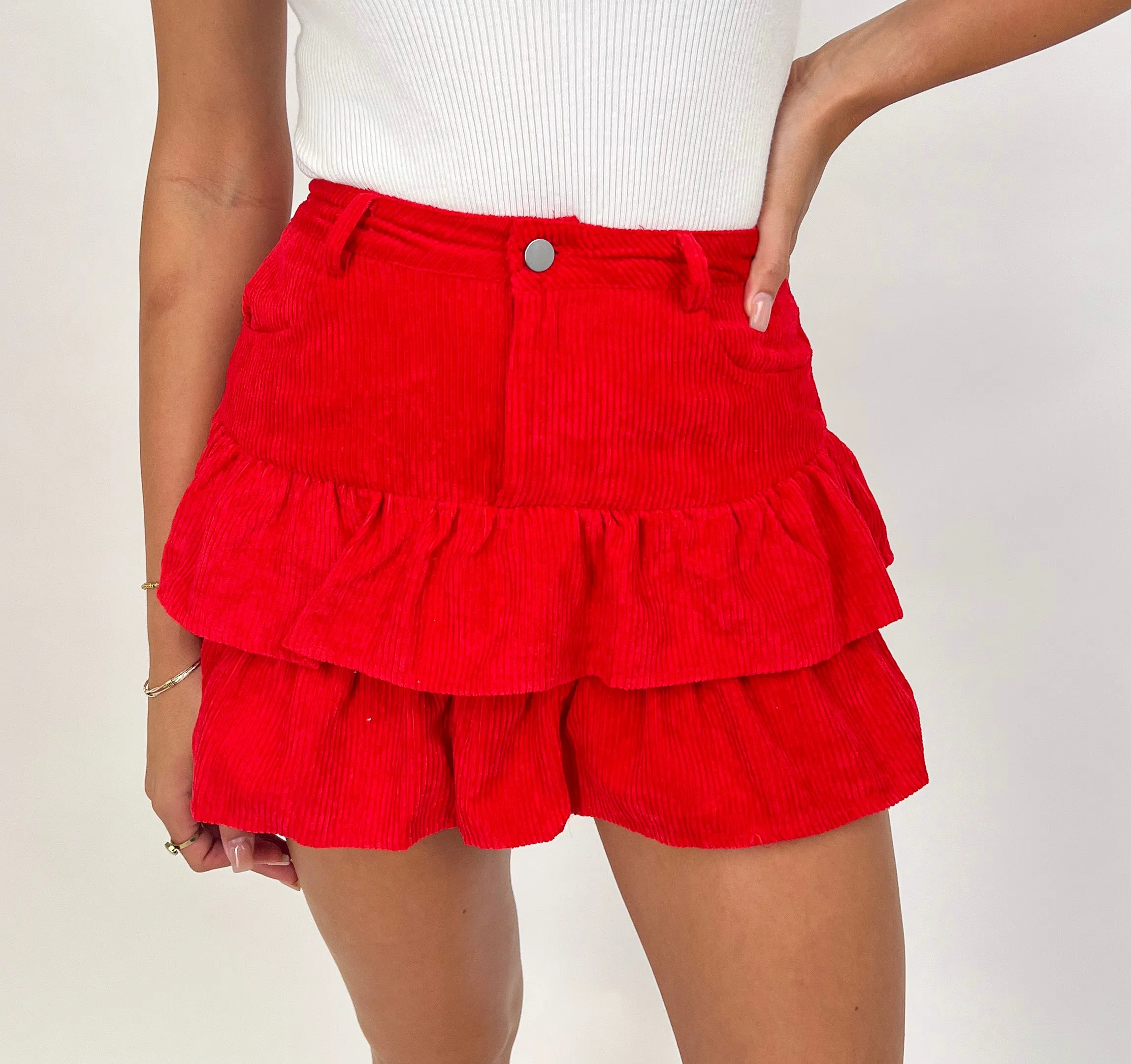 NEVER GROW UP RED CORDUROY RUFFLE MINI SKORT