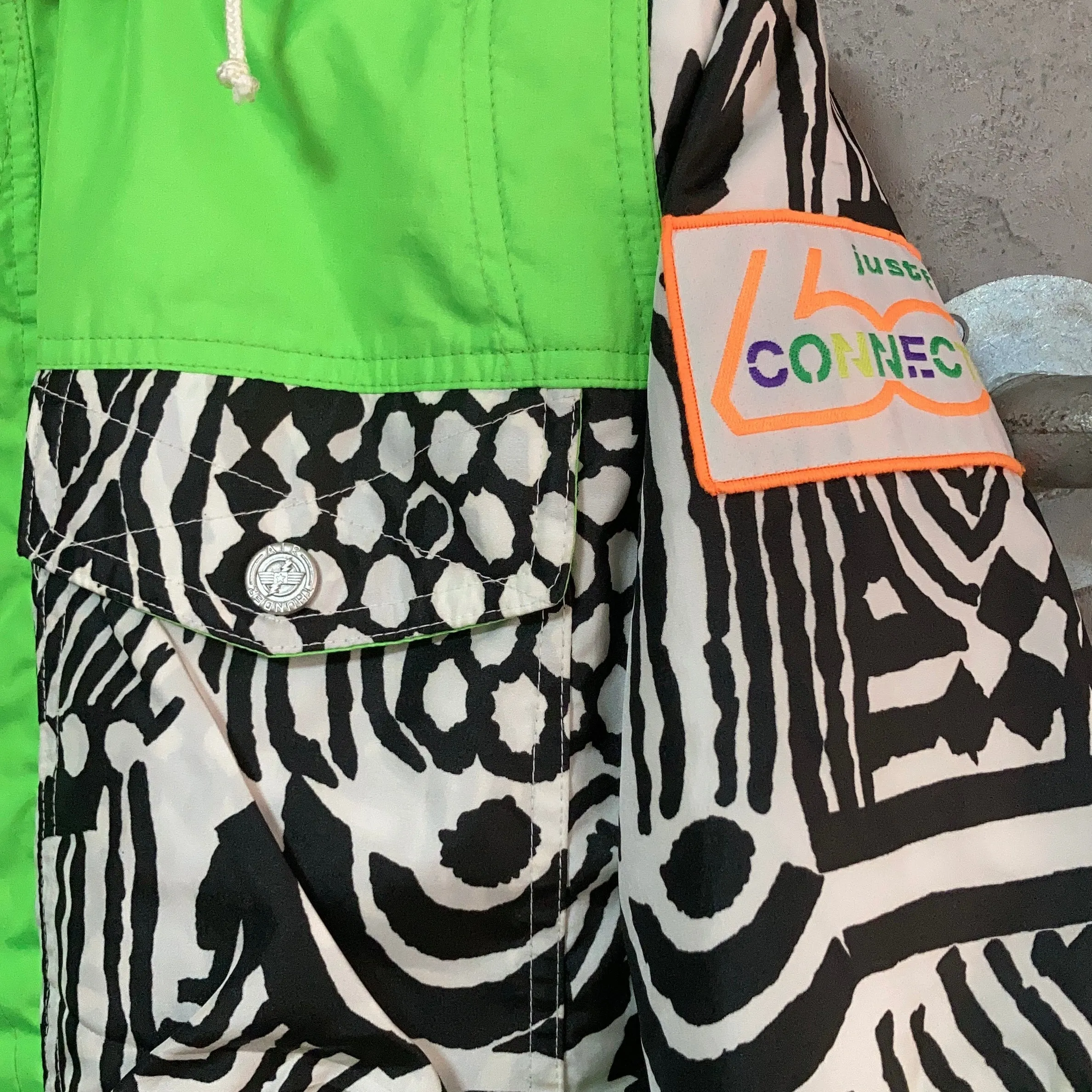 zebra printed ski jacket neon green